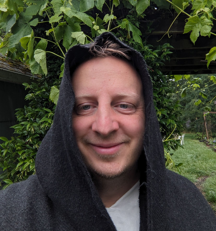 Tony in his wool cloak on a rainy day